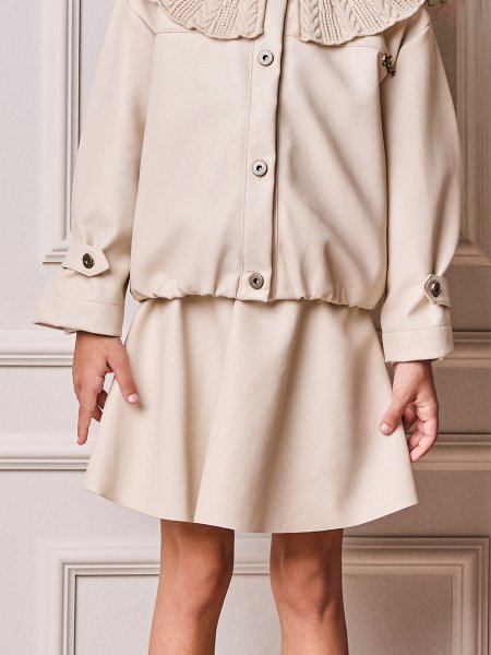 Saia Infantil Menina Animê Fake Leather com Pingente